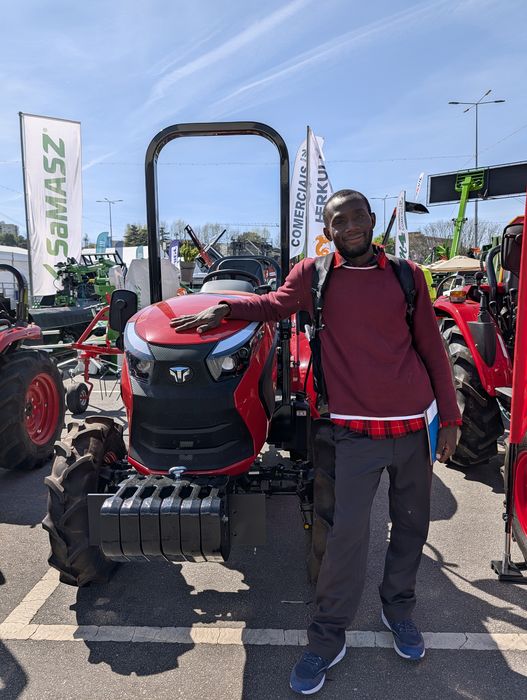 Farm machinery expo, compact tractor on display, 2026