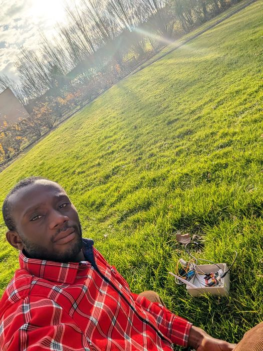 Testing a sensor prototype outdoors on the lawn, 2025